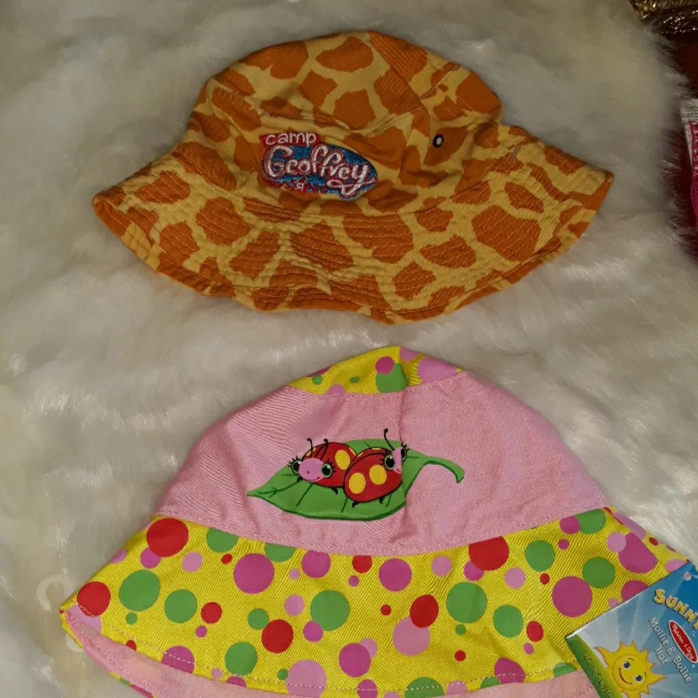 Melissa and Doug and Geoffrey the Giraffe kids hats